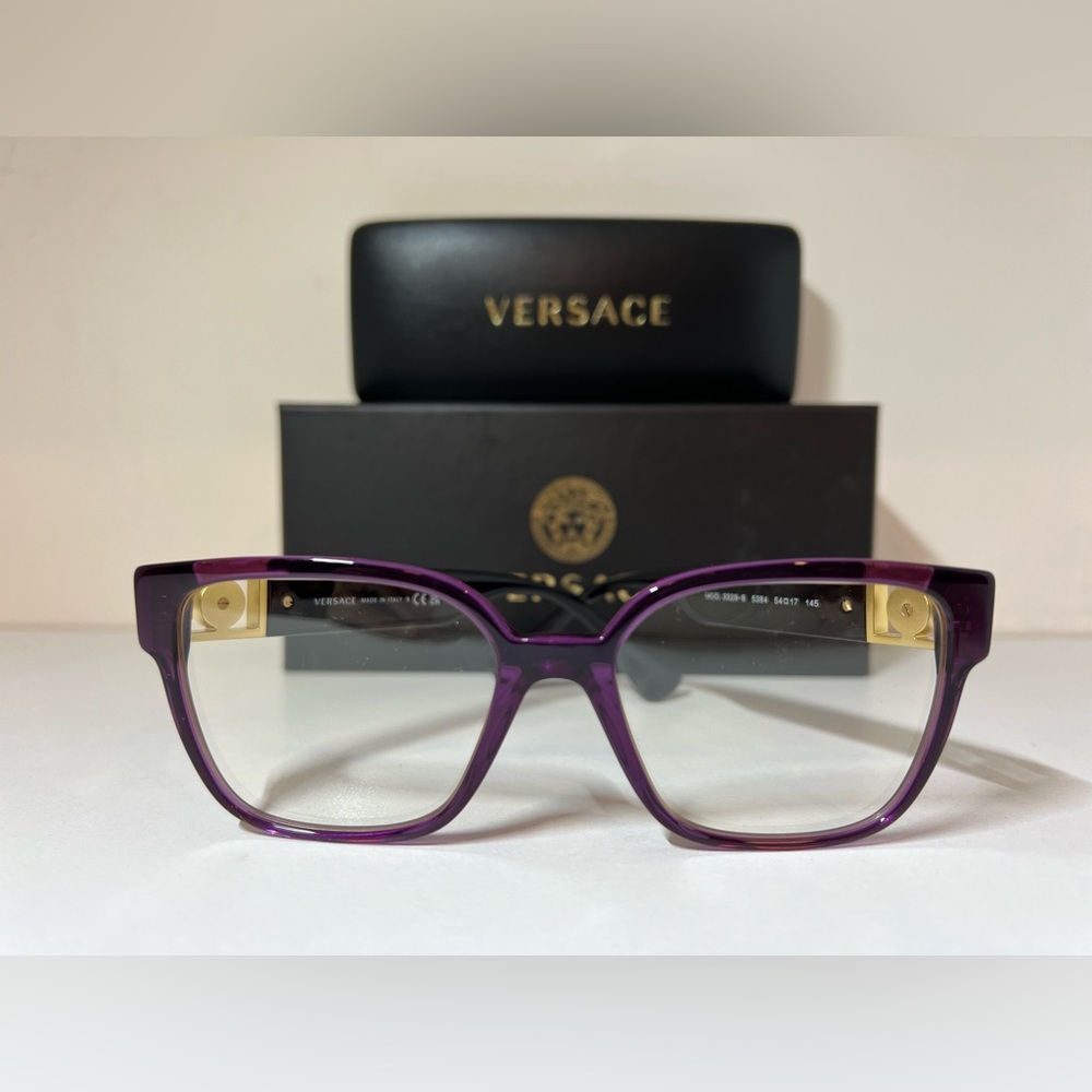Ladies NIB Versace eyeglasses, style 3329-B in translucent plum size 54